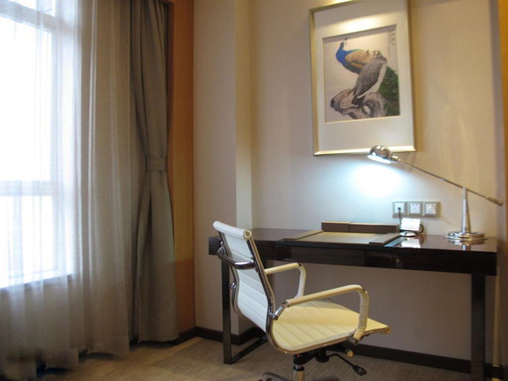 Guangzhou Manguo Internation Hotel Quarto foto